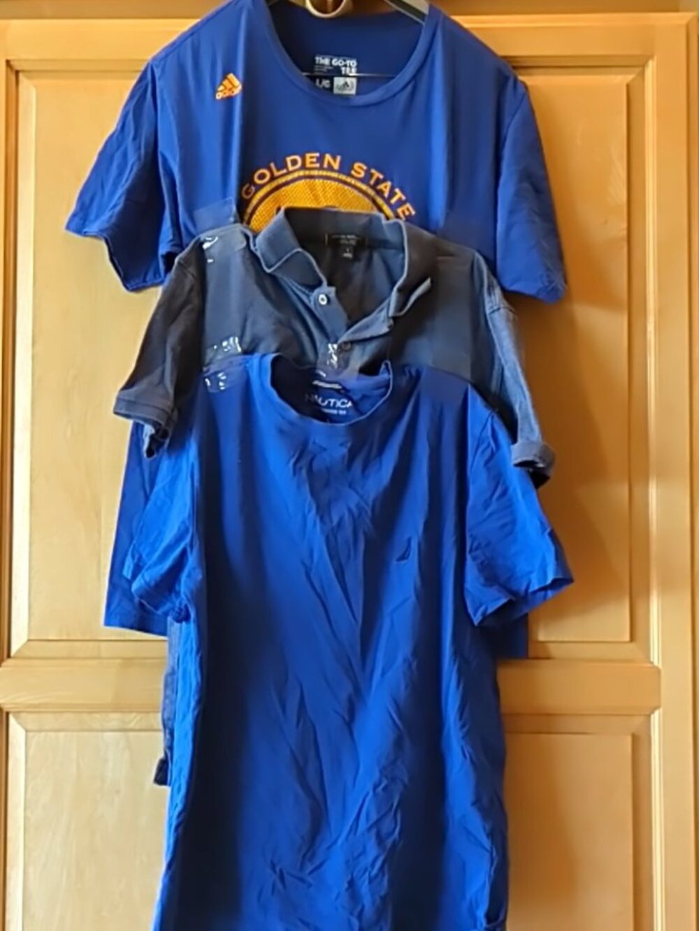 2 t-shirts and a polo